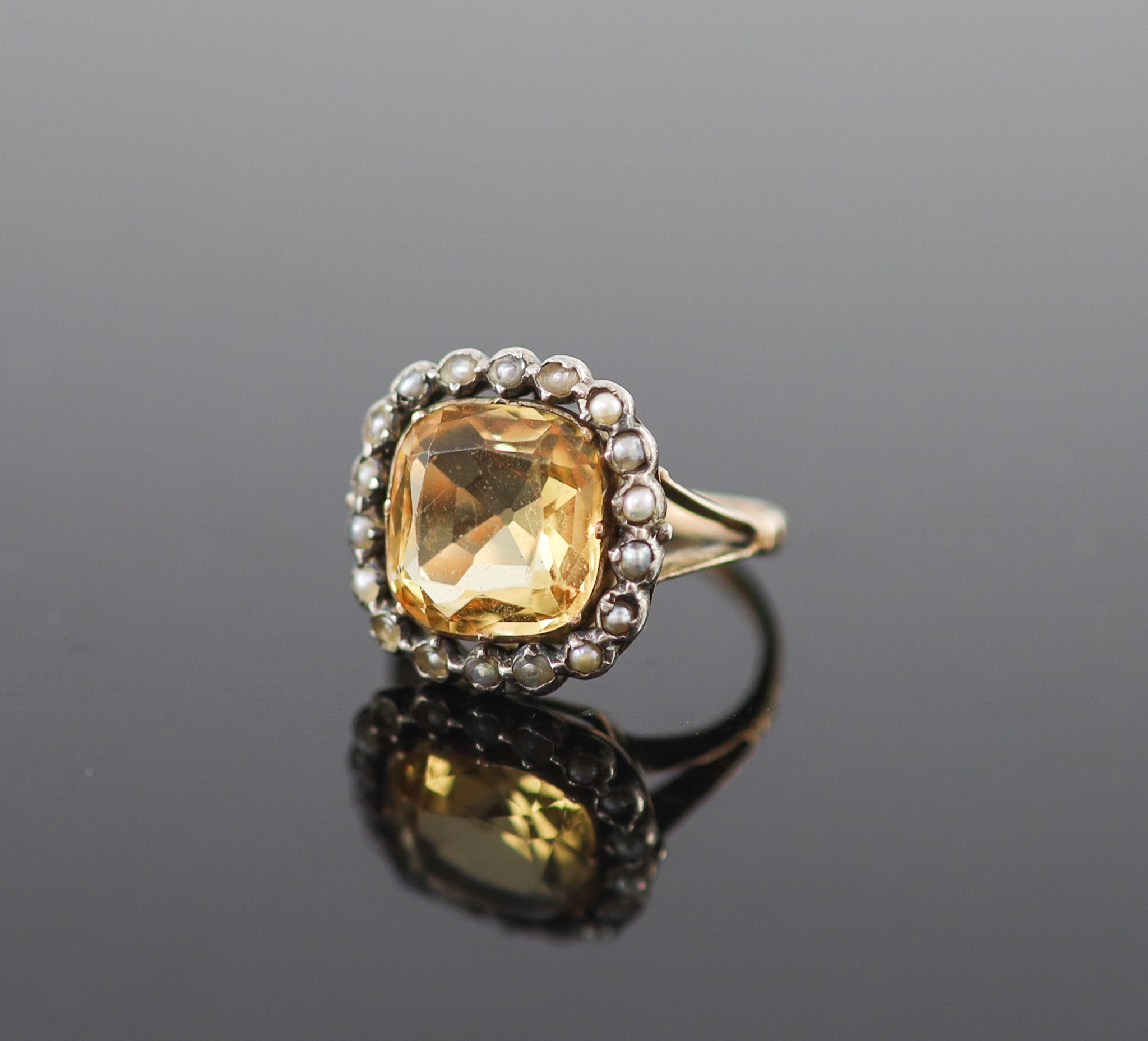 A 19th century gold, citrine and seed pearl set shaped square cluster ring